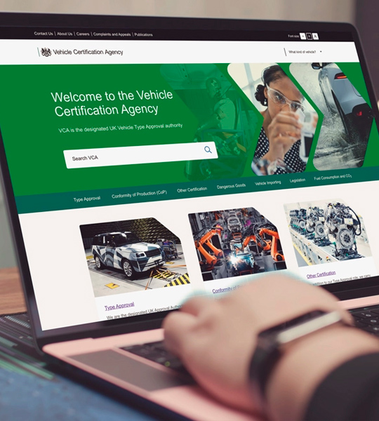 Vehicle Certification Agency Website on Laptop Device